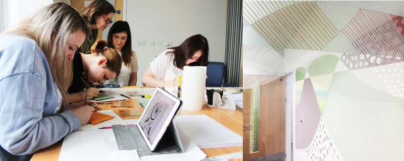 Group of women working on crafts at a wooden desk