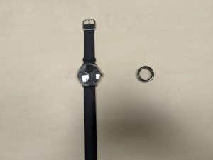 A photograph of the smart watch and smart ring