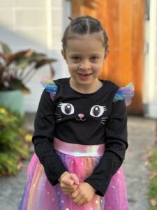 Ava Begley wearing a cat costume and pink tutu