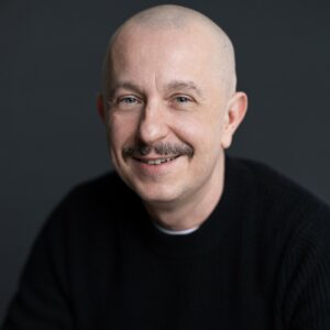 Headshot of Professor Maciej Tomaszewski