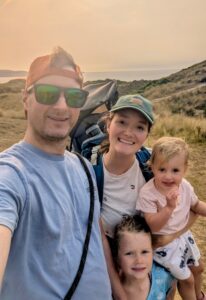 Selfie of a family on a hike.