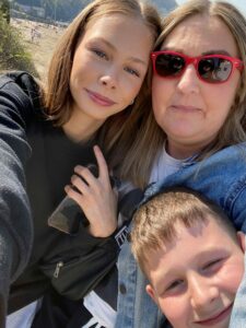 Selfie of Heather Bluer with her two children