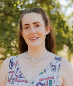 Woman smiling to camera.