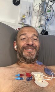 Ian Tonks with medical devices attached to his chest